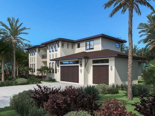 prairie-style house featuring a garage