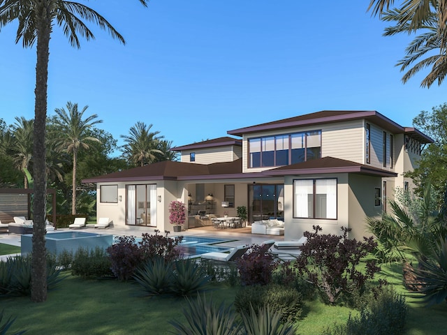 rear view of house featuring a patio and an outdoor hangout area