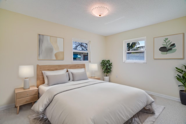 bedroom featuring a textured ceiling