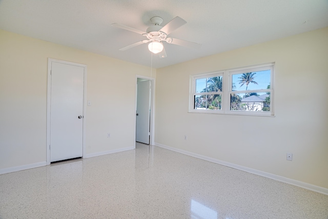 empty room with ceiling fan