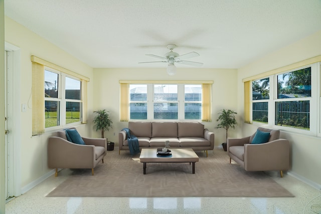 sunroom / solarium with ceiling fan