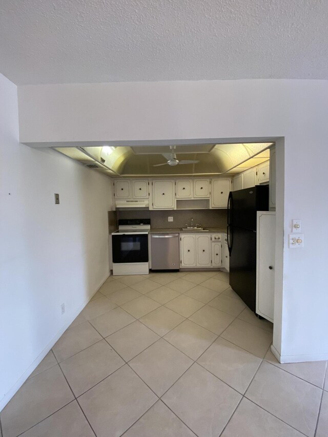 kitchen featuring white cabinetry, white electric range oven, dishwasher, black fridge, and sink