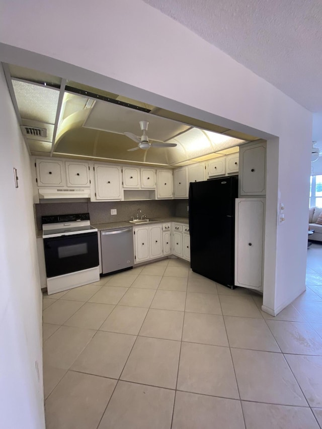 kitchen featuring ceiling fan, dishwasher, black refrigerator, white cabinetry, and range with electric cooktop