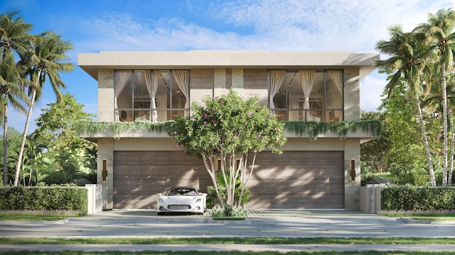 view of front of home with a garage