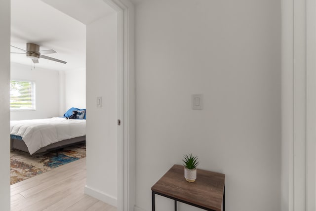 bedroom featuring ceiling fan and wood-type flooring