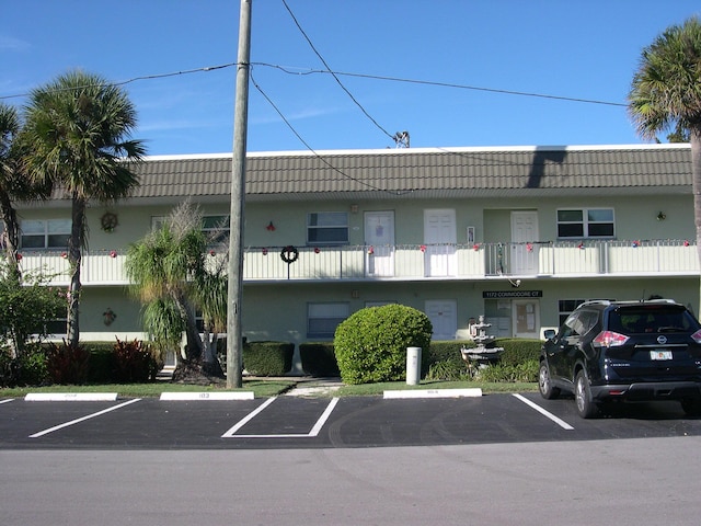 1172 Commodore Ct Unit 204, Fort Pierce, FL 34949 - view of property with uncovered parking