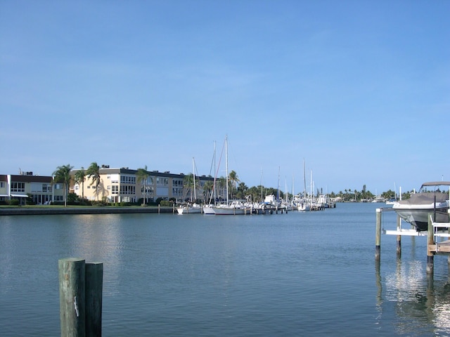 1172 Commodore Ct Unit 204, Fort Pierce, FL 34949 - water view featuring a boat dock and boat lift
