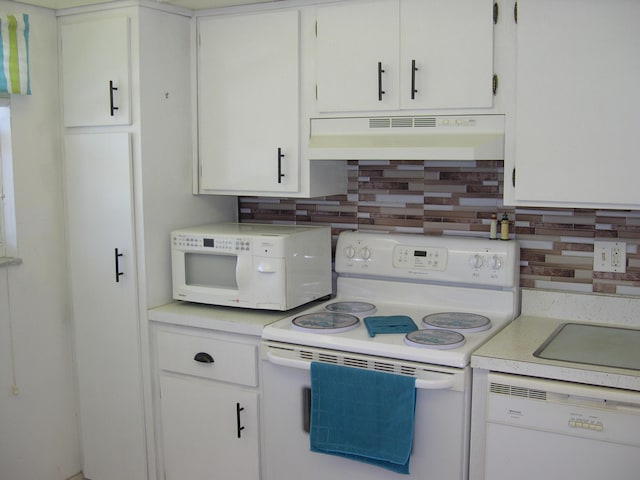 kitchen featuring white cabinetry, white appliances, premium range hood, and tasteful backsplash