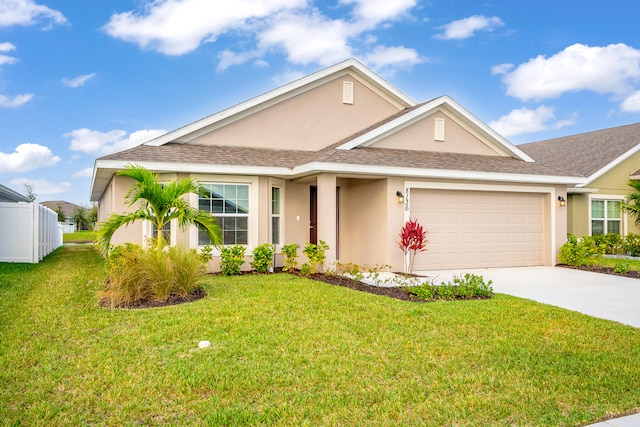 single story home featuring a front yard and a garage