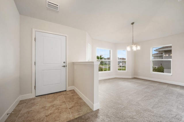 interior space featuring a chandelier