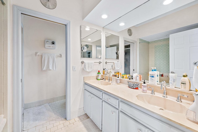 bathroom with vanity and tile patterned floors