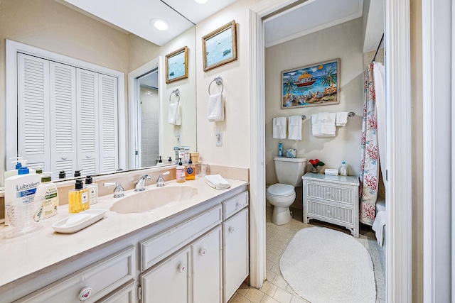 bathroom with vanity, toilet, a shower with curtain, and tile patterned floors