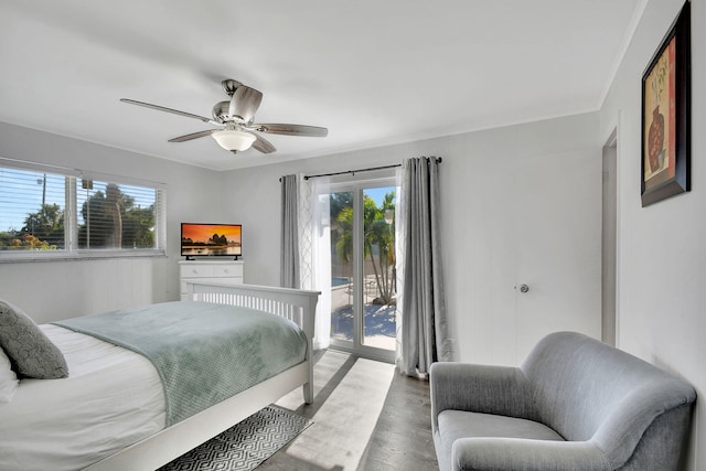 bedroom featuring ceiling fan and access to outside