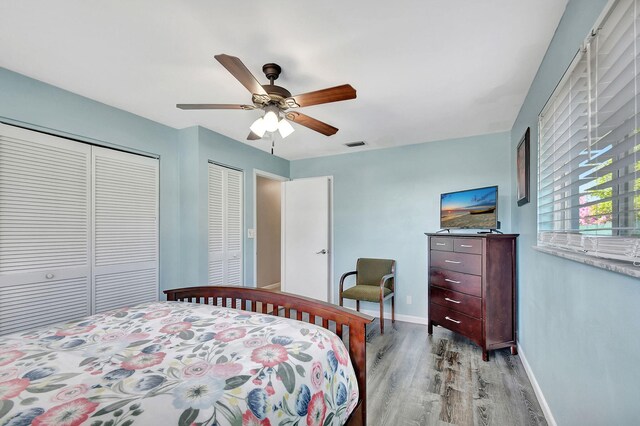 bedroom featuring light wood-type flooring and ceiling fan