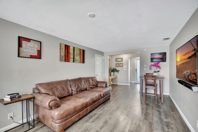 living room featuring light wood-type flooring