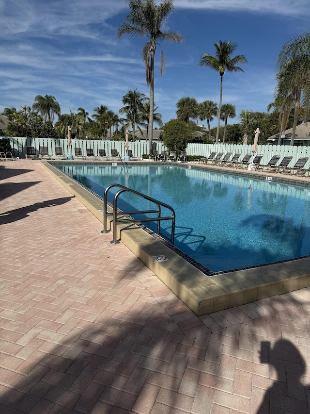 view of swimming pool featuring a patio