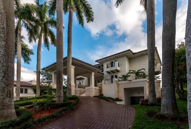 view of front of property with a garage