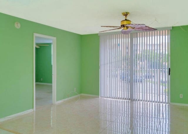 spare room featuring ceiling fan