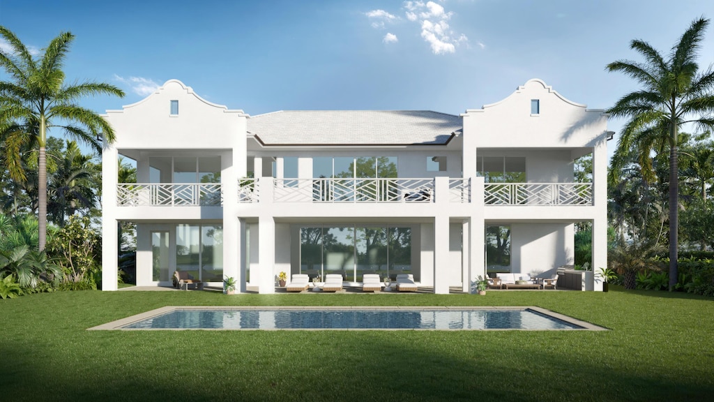 rear view of house with a balcony, a patio, an outdoor hangout area, and stucco siding