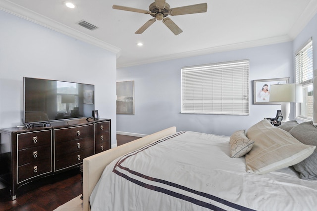 bedroom featuring dark wood-type flooring, ornamental molding, and ceiling fan