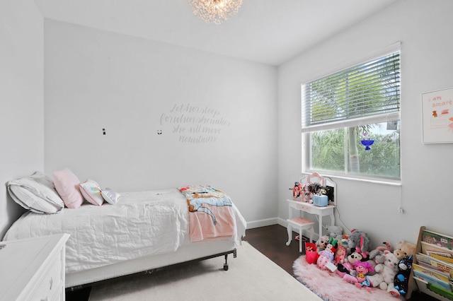 bedroom featuring dark wood-type flooring