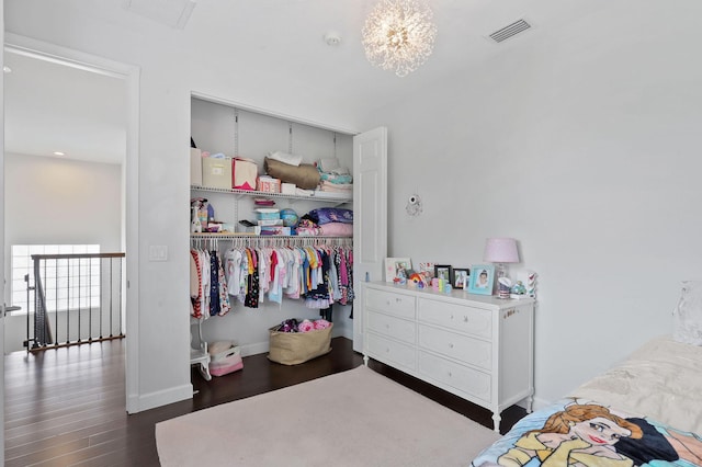 143 Isle Verde Way, Palm Beach Gardens, FL 33418 - bedroom with a closet, wood finished floors, and baseboards