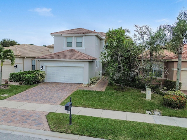 143 Isle Verde Way, Palm Beach Gardens, FL 33418 - mediterranean / spanish home featuring a tiled roof, stucco siding, a garage, decorative driveway, and a front yard