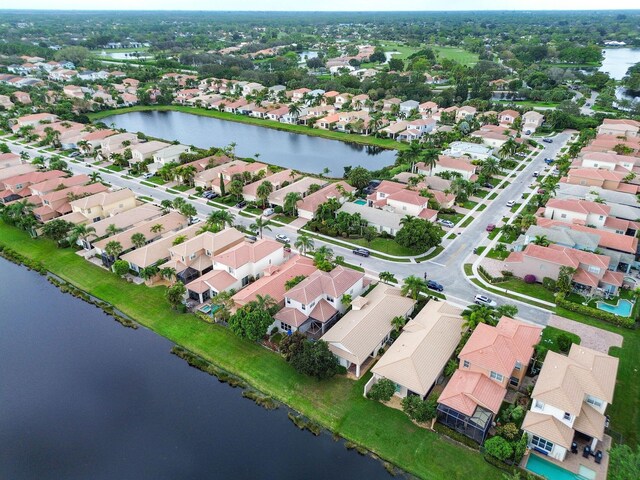 143 Isle Verde Way, Palm Beach Gardens, FL 33418 - aerial overview of property's location featuring nearby suburban area and a nearby body of water