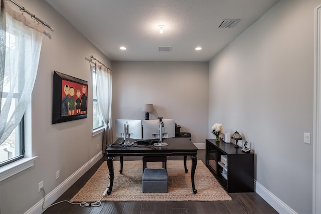 office area with a healthy amount of sunlight and wood-type flooring