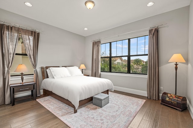 bedroom featuring hardwood / wood-style flooring