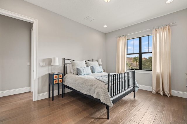 bedroom featuring wood-type flooring