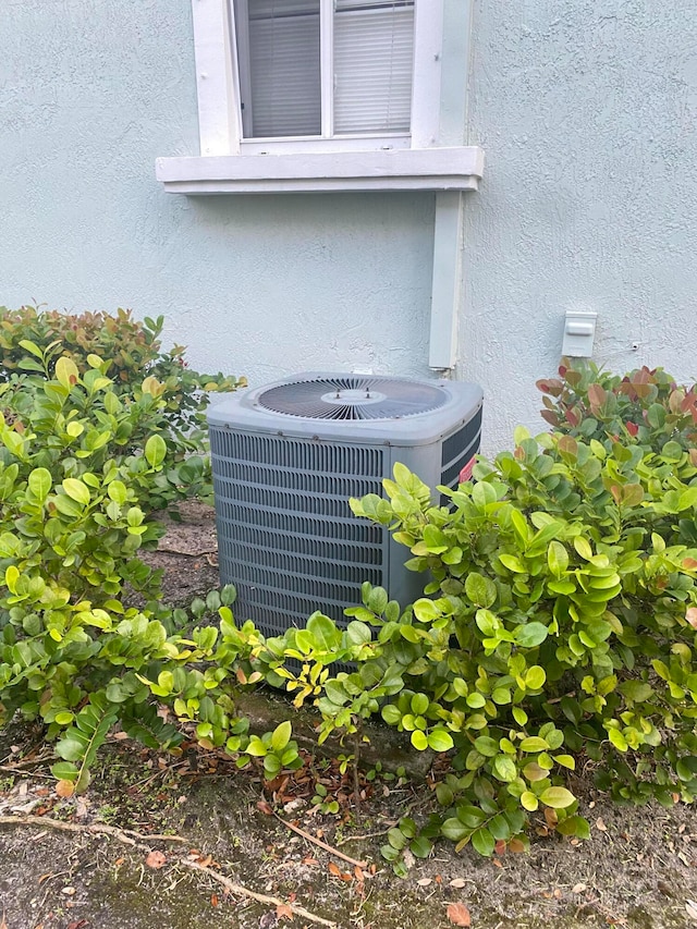 exterior details featuring cooling unit