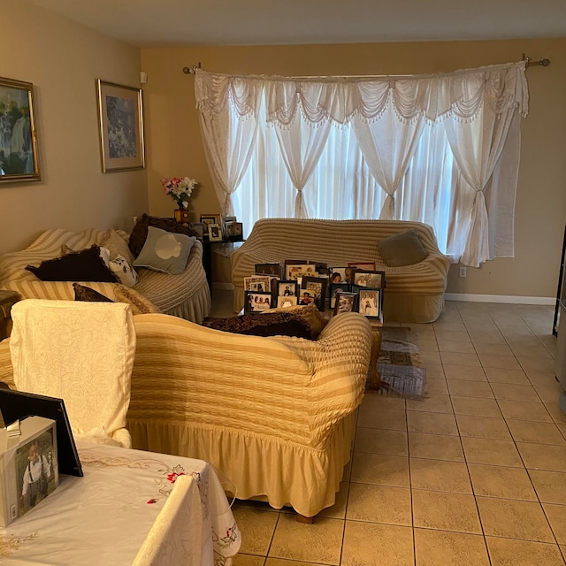 living room with tile patterned floors