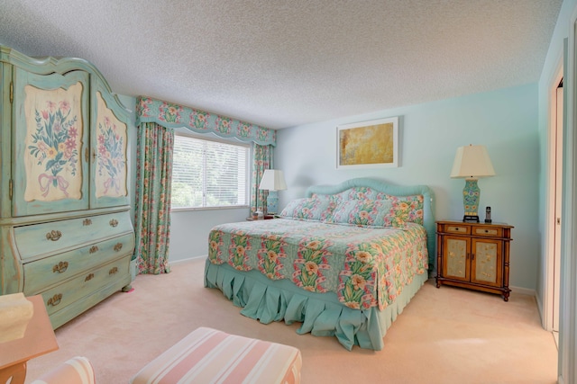 carpeted bedroom with a textured ceiling