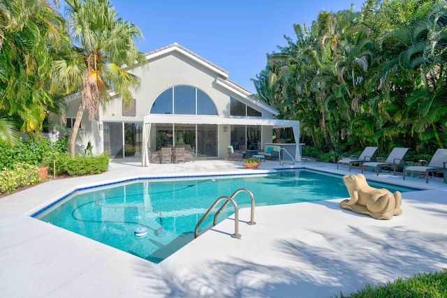 view of pool featuring a patio area