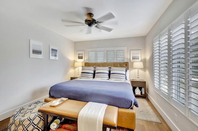 bedroom featuring ceiling fan and light wood-type flooring