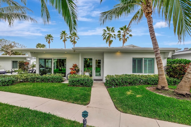 view of front of house with a front lawn