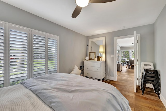 bedroom featuring ceiling fan and light wood-type flooring