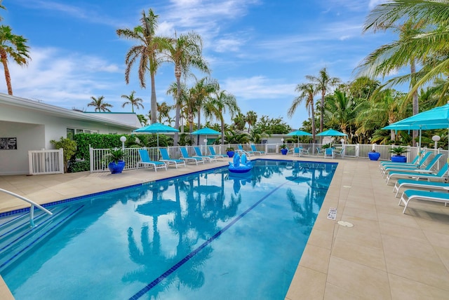 view of swimming pool with a patio area