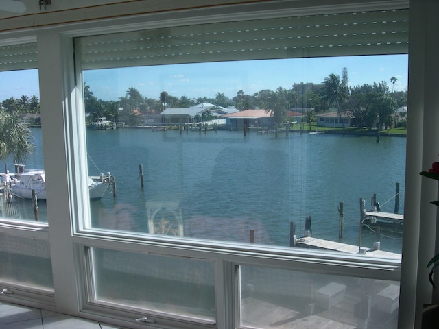 property view of water featuring a boat dock