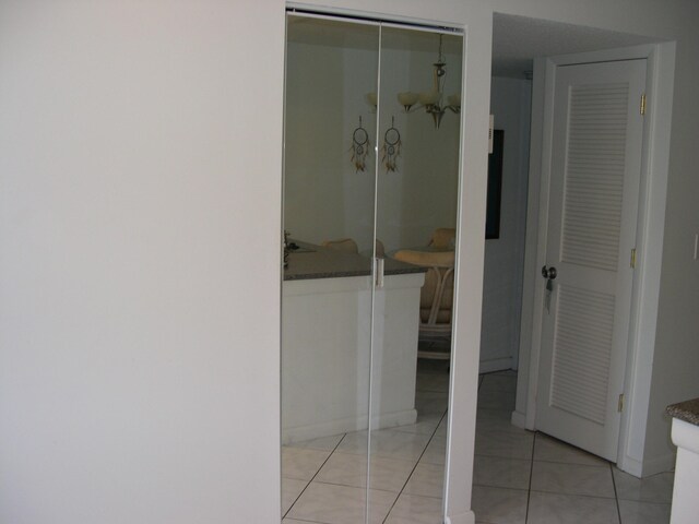 bathroom with tile patterned floors