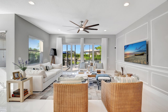 living room featuring ceiling fan