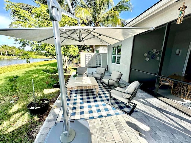 view of patio / terrace featuring a water view