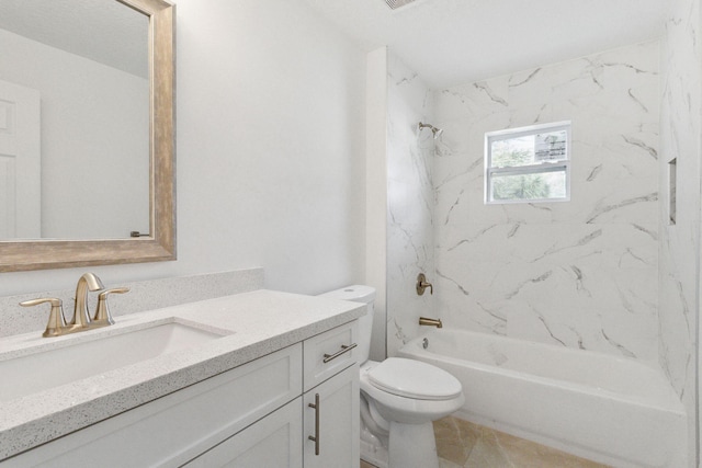 full bathroom with tiled shower / bath combo, toilet, and vanity