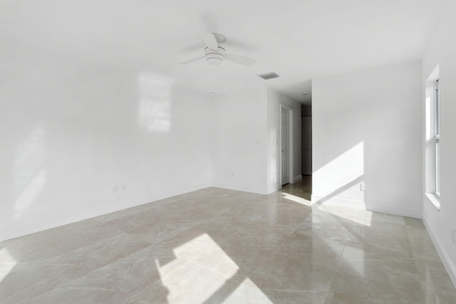 unfurnished room featuring ceiling fan