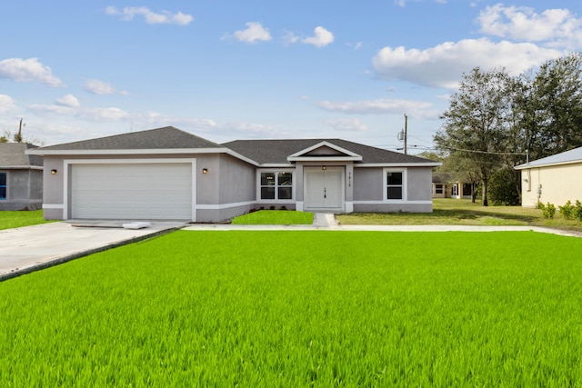 single story home with a garage and a front yard