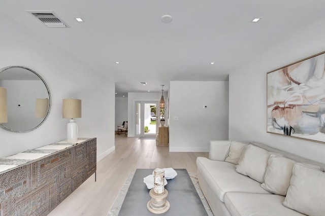 530 NW 14th St, Delray Beach, FL 33444 - living room featuring light wood finished floors and baseboards