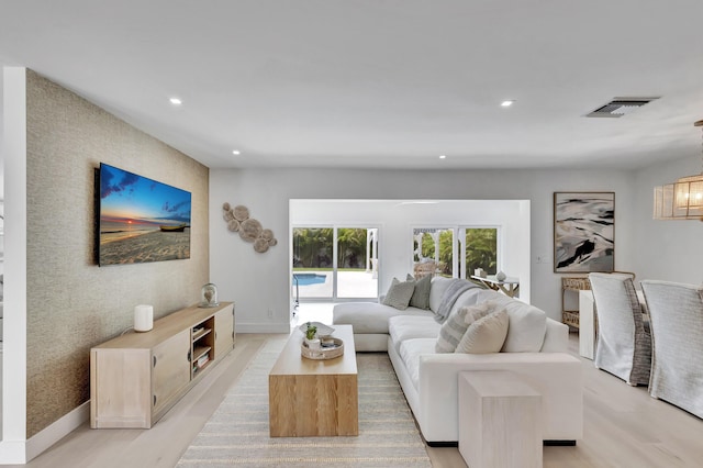 530 NW 14th St, Delray Beach, FL 33444 - living room featuring recessed lighting, baseboards, and light wood-style flooring