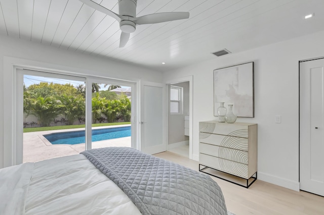 530 NW 14th St, Delray Beach, FL 33444 - bedroom with access to exterior, multiple windows, light wood-style floors, and baseboards