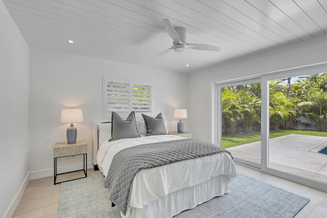 530 NW 14th St, Delray Beach, FL 33444 - bedroom with access to exterior, a ceiling fan, recessed lighting, baseboards, and wood finished floors